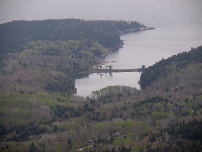 [Water inlet to Mount Desert Island with an earth bridge across the water approximately one third of the way from furthest inland point. Many trees still not yet with leaves.]